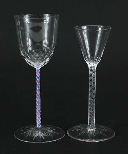 Two antique wine glasses with opaque twist stems, the larges...