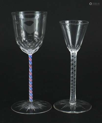 Two antique wine glasses with opaque twist stems, the larges...