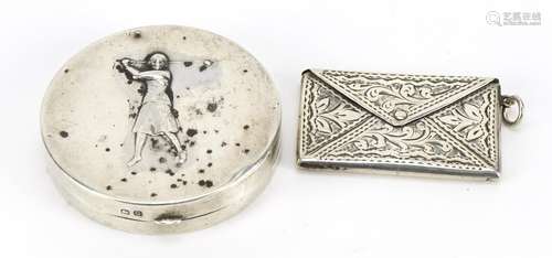 Circular silver golfing interest compact and a double stamp ...