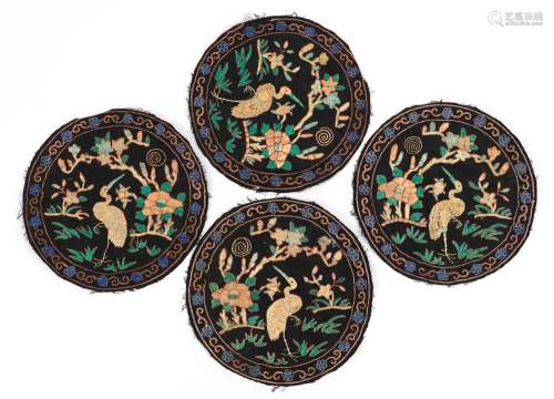 Set of four Chinese textile roundels embroidered with birds ...