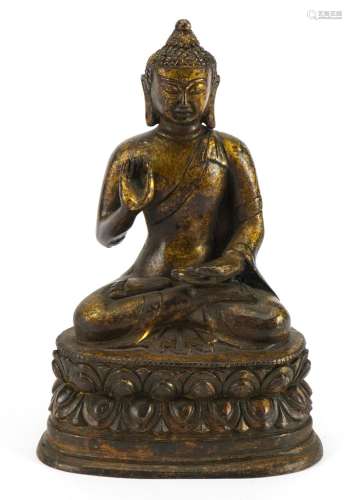 Chino Tibetan partially gilt bronze figure of seated Buddha,...
