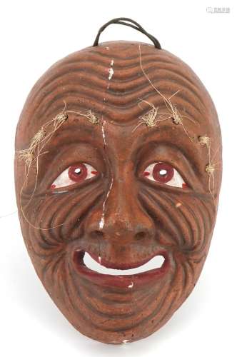 Japanese pottery Noh theatre mask, impressed character marks...
