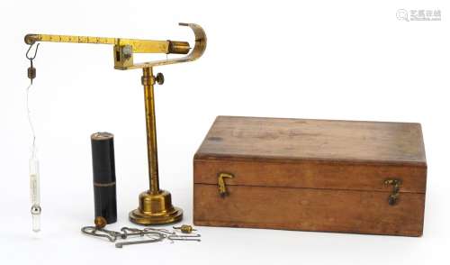 Set of antique brass specific gravity balances with Reimanns...