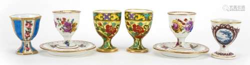 Six 19th century porcelain eggcups including a pair by Dresd...