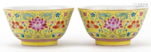 Pair of Chinese porcelain yellow ground bowls hand painted w...
