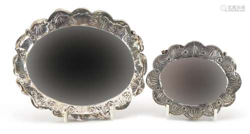 Two Turkish 900 grade silver vanity mirrors embossed with fl...