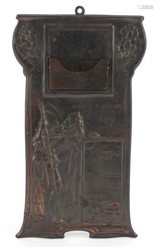 Art Nouveau copper wall plaque embossed with a man holding a...