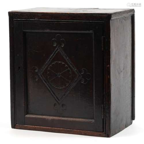 18th century carved oak table chest with hinged door opening...