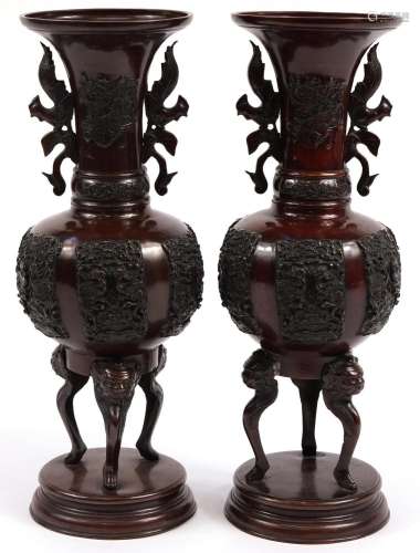 Pair of Japanese patinated bronze three footed vases with tw...