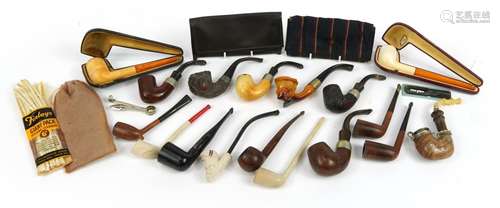 Collection of Meerschaum style smoking pipes including one w...