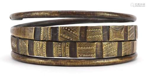 African tribal interest bronze coiled arm bracelet, possibly...