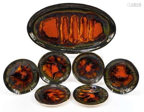 Eric Leaper, Set of six Newlyn pottery plates and platter in...