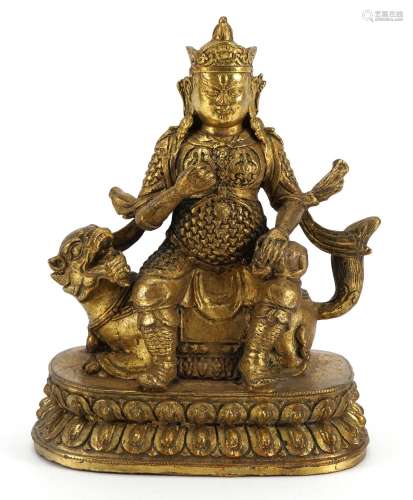Chino Tibetan gilt bronze mythical figure, 23cm high