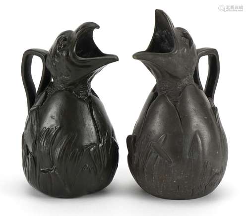 J Garnier, matched pair of French Art Nouveau pewter jugs in...