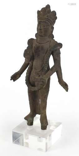 South East Asian patinated bronze goddess raised on a square...