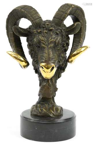 Partially gilt patinated bronze bust of a rams head raised o...