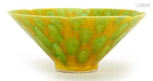 Chinese porcelain bowl having a green and yellow spotted gla...