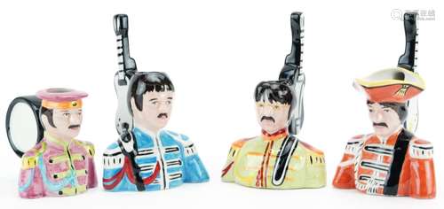 Set of four The Beatles interest Lorna Bailey character jugs...