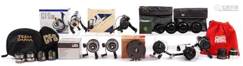 Eight vintage and later fishing reels, some with boxes, comp...