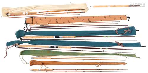 Collection of vintage and later fishing rods, some split can...