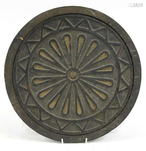 Cast iron coal hole, 39cm in diameter