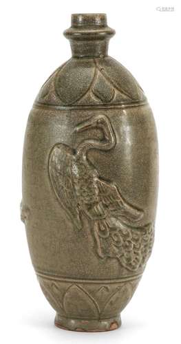 Korean celadon glazed vase decorated in relief with a bird, ...