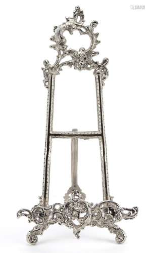 Rococo style silvered metal easel stand, 41cm high