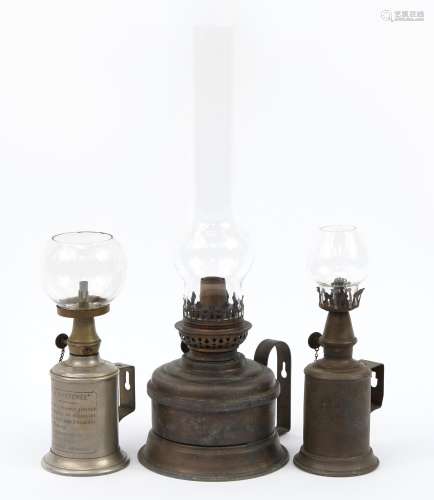 Two vintage French oil lamps and one other, including a Pige...
