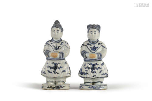 Two Blue and White Figurines