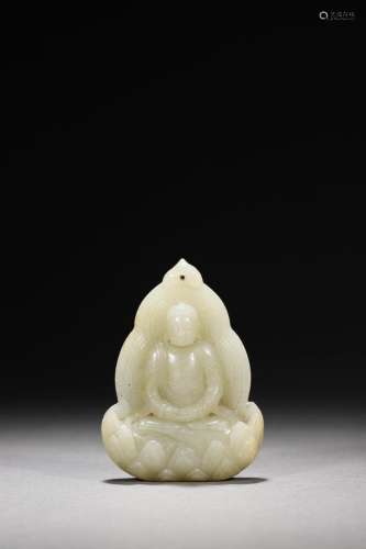Ming: A Carved jade Shakyamuni Statue