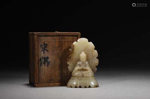 Song Dynasty: A Carved Ajde Buddha Statue.