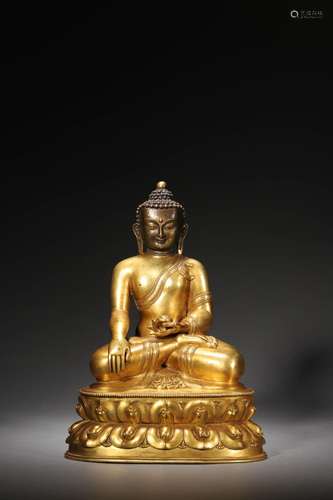 Ming: A Gilt Bronze Seated Sakyamuni Statue