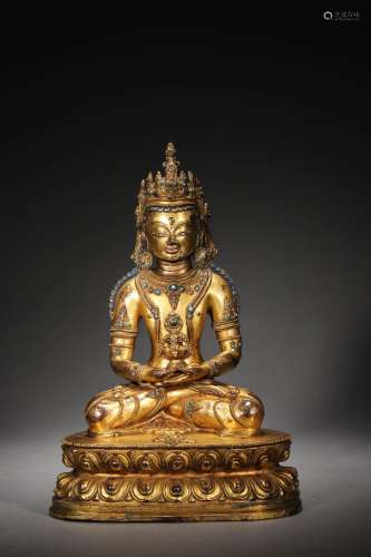 Early Qing: A Gilt Bronze Seated Guanyin Statue