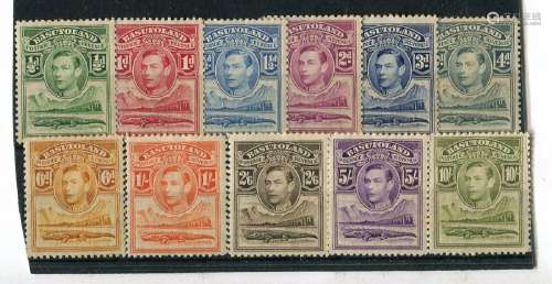 A George VI Crown album mint stamp collection with Basutolan...