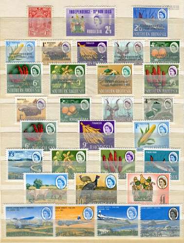 A collection of Great British Commonwealth stamps in two alb...