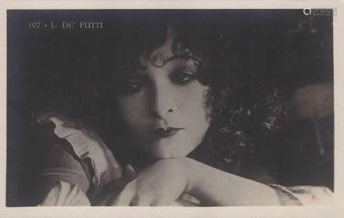A collection of approximately 75 postcards of early film act...