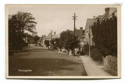 A collection of 35 postcards of Sussex, including photograph...