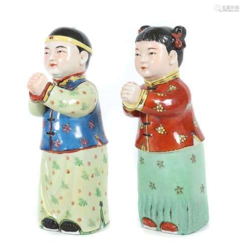 Figurenpaar China, 20. Jh., Keramik/polychrom staffiert, män...