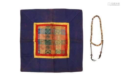 λ A TIBETAN BONE MALA AND AN ALTAR CLOTH