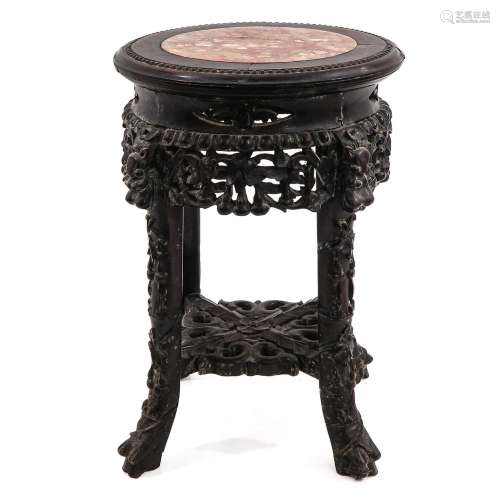 A Round Carved Marble Top Side Table