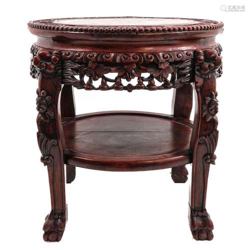 A Round Carved Marble Top Side Table