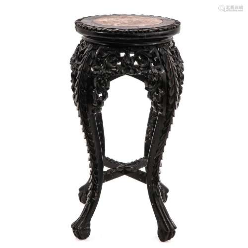 A Carved Round Marble Top Side Table