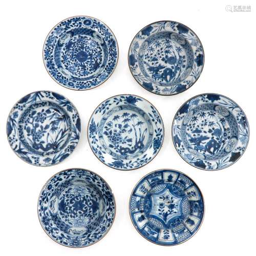 A Collection of 7 Small Blue and White Plates