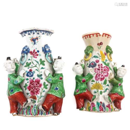 A Pair of Famille Rose Altar Vases