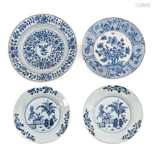 A Collection of 4 Blue and White Plates