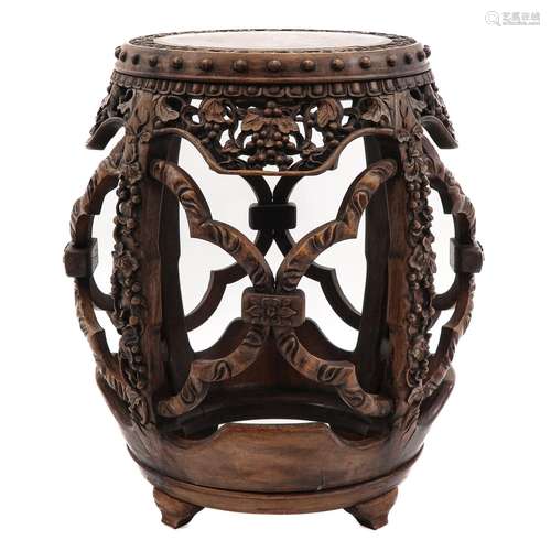 A Carved Chinese Drum Table