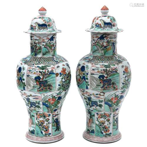 A Pair of Famille Verte Covered Vases