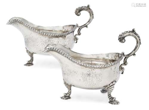 A pair of George II silver gravy boats, London, 1759, Willia...