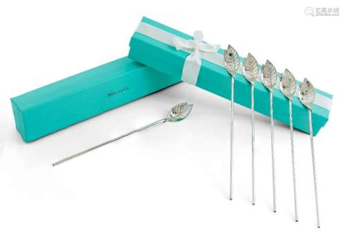 Six cocktail straws retailed by Tiffany & Co., each stam...