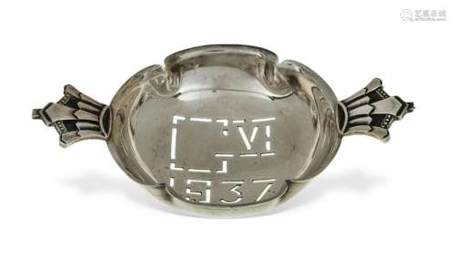 A silver strainer by Robert Edgar Stone, London, 1936, comme...